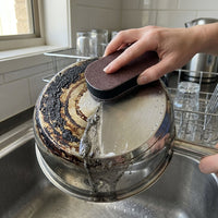 SPONJ pad cleaning a burnt pot